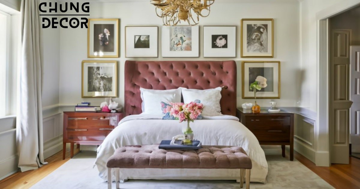 A gallery wall adorned with framed artwork and family photos, creating a personalized focal point in the mansion bedroom. Each frame showcases a unique piece, ranging from landscapes and portraits to abstract paintings. A decorative vase with fresh flowers sits on a nearby table, adding a pop of color and fragrance to the space.